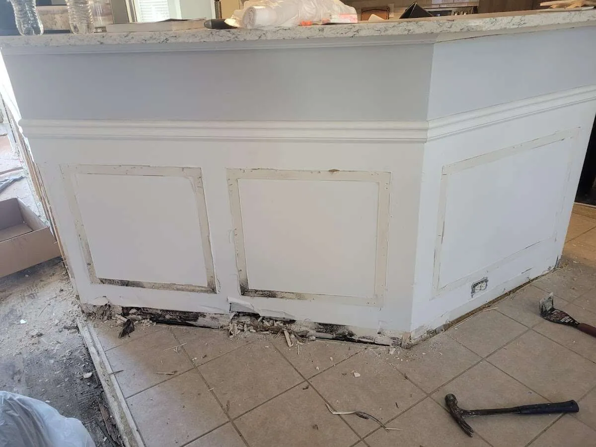 Water damage and mold on kitchen during Storm Damage Restoration in East Manchester